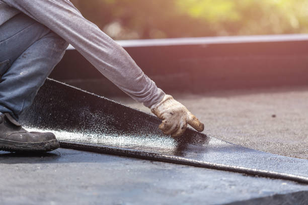 Professional Basement Waterproofing technician working in Bellevue, KY